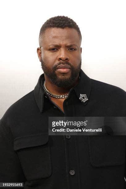 Winston Duke attends a photocall during Fendi Fall/Winter 